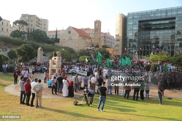Lebanese and Palestinian people gather to stage a demonstration to protest the Israeli violations and restrictions against the Al-Aqsa Mosque, in...