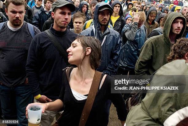 People attend the 20th edition of the French rock festival "Les eurockeennes de Belfort", on July 06, 2008 in Belfort, eastern France. The music...