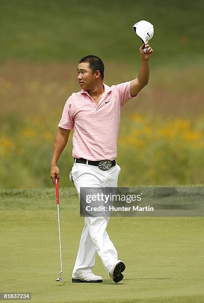 Anthony Kim acknowledges the crowd on the 18th hole after finishing the final round of the AT&T National at Congressional Country Club on July 6,...