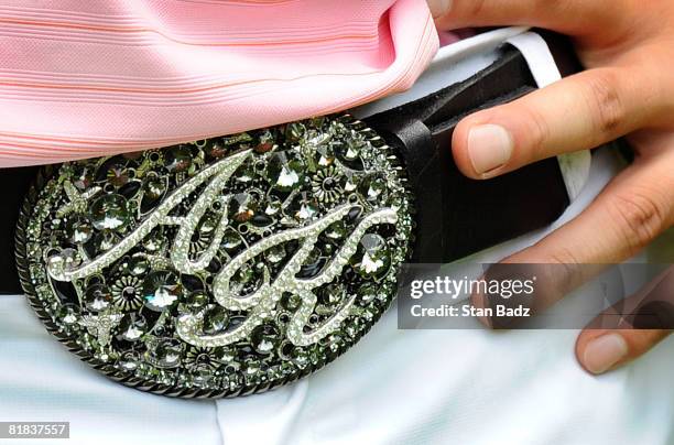 Anthony Kim wears a decorative belt buckle during the final round of the AT&T National held on the Blue Golf Course at Congressional Country Club on...