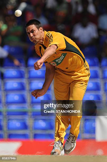 Australian cricketer Mitchell Johnson delivers against West Indies on July 6, 2008 at Warner Park in Basseterre during their One-Day International...