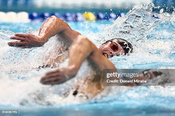 Erik Vendt, top, races Chad LaTourette in the final of the 1500 meter freestyle during the U.S. Swimming Olympic Trials on July 6, 2008 at the Qwest...