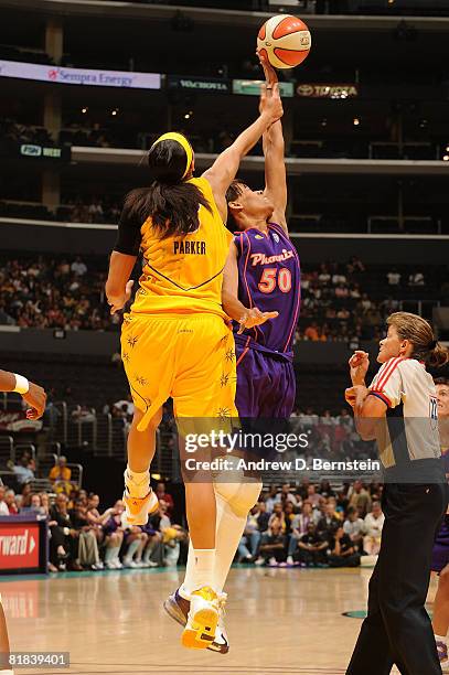 Candace Parker of the Los Angeles Sparks goes up for a jump ball during the game against Tangela Smith of the Phoenix Mercury on July 6, 2008 at...