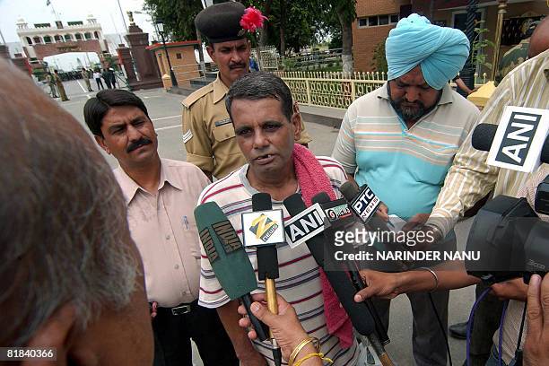 Released Indian prisoner Ram Prakash addresses media representatives after crossing The India-Pakistan Border at Wagah on July 7, 2008. Prakash,...