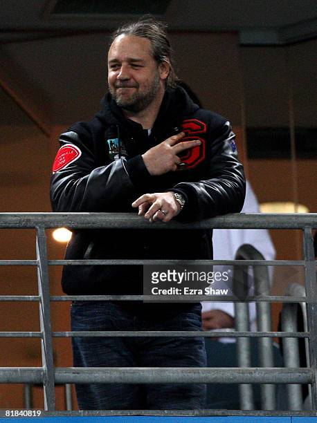 Rabbitohs co-owner actor Russell Crowe gestures before the start of the round 17 NRL match between the Bulldogs and the South Sydney Rabbitohs at ANZ...