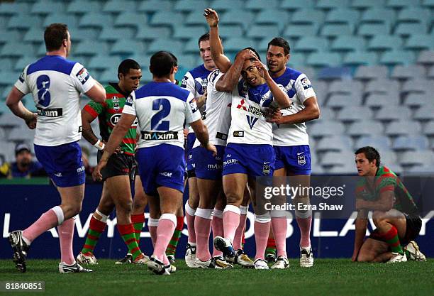 Arana Taumata of the Bulldogs celebrates after scoring a try during the round 17 NRL match between the Bulldogs and the South Sydney Rabbitohs at ANZ...