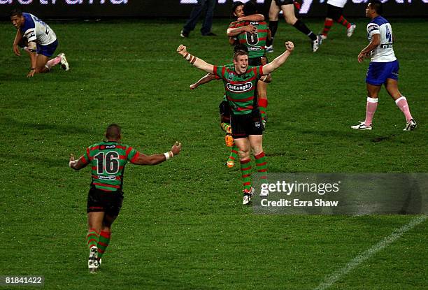 Michael Greenfield of the Rabbitohs celebrates after the Rabbitohs socred a golden point try during the round 17 NRL match between the Bulldogs and...