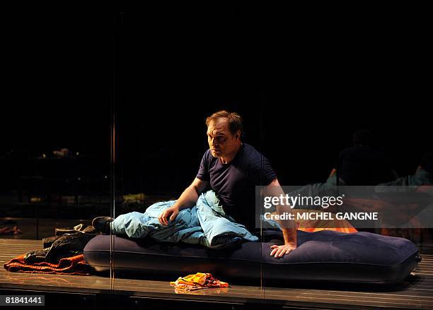French Jean-Louis Coulloc'h performs in the play "Feux" by French directors Daniel Jeanneteau and Marie-Christine Soma on July 6, 2008 in Avignon,...