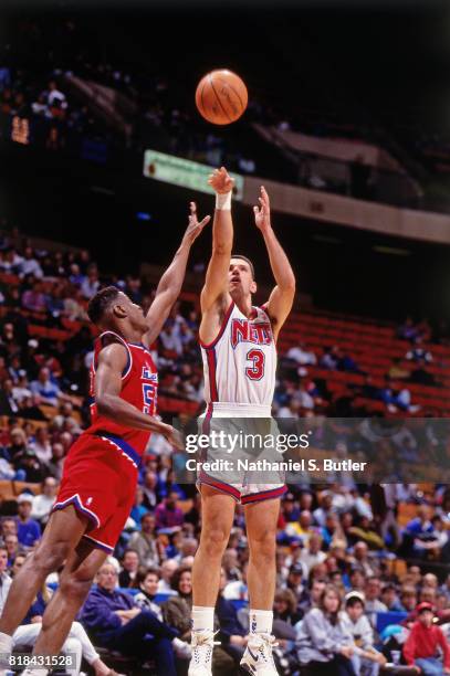 Drazen Petrovic of the New Jersey Nets shoots against the Washington Bullets at the Brendan Byrne Arena in East Rutherford, NJ circa 1991. NOTE TO...