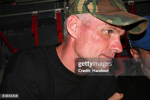 In this handout from the U.S. Embassy, Keith Stansell sits inside a plane after being rescued from a FARC base by the Colombian Army as U.S....