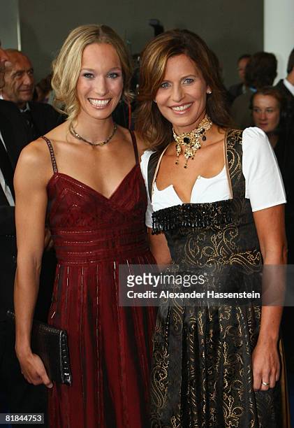 Kick boxing world champion Christine Theiss pose with TV presenter Katrin Mueller-Hohenstein prior to the Bavarian Sport Award 2008 at the...