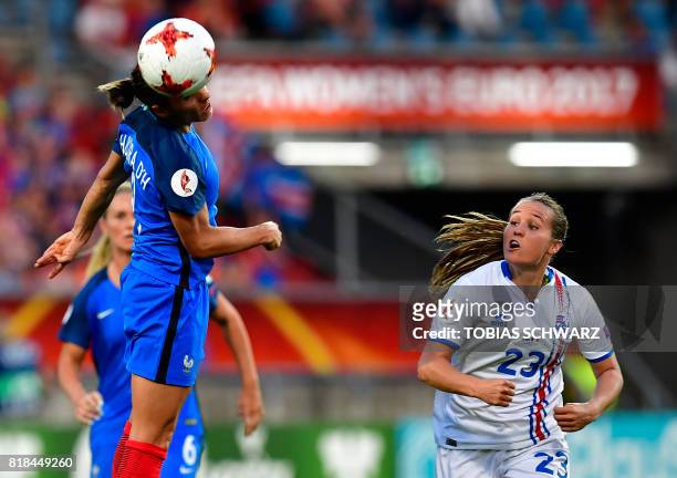 Iceland's forward Fanndis Fridriksdottir and France's defender Jessica Houara d'Hommeaux go for the ball during the UEFA Women's Euro 2017 football...