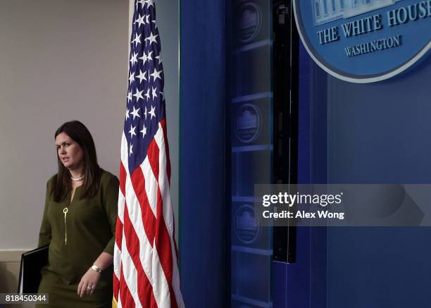 Principal Deputy Press Secretary Sarah Huckabee Sanders walks towards the podium to conduct an off-camera press briefing at the James Brady Press...