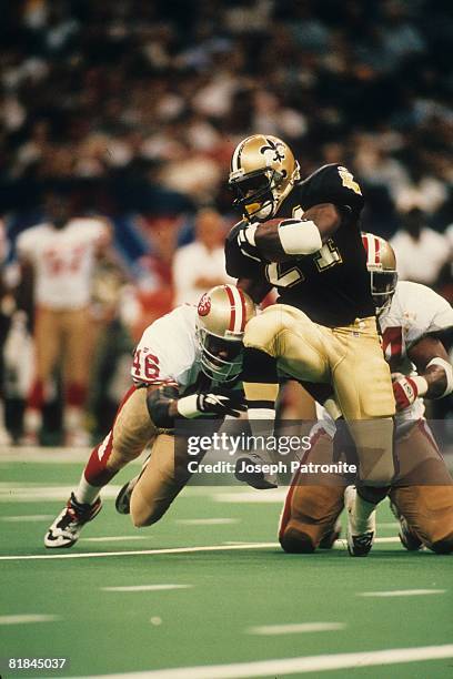 Running back Mario Bates of the New Orleans Saints runs upfield against the San Francisco 49ers at the Superdome on September 3, 1995 in New Orleans,...