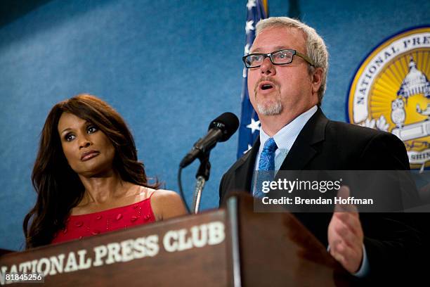 Larry Jones, president of the network TV Land, speaks with former model Beverly Johnson at a news conference July 7, 2008 in Washington, DC. The news...