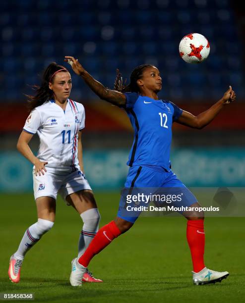 Élodie Thomis of France and Hallbera Gísladóttir of Iceland compete for the ball during the Group C match between France and Iceland during the UEFA...