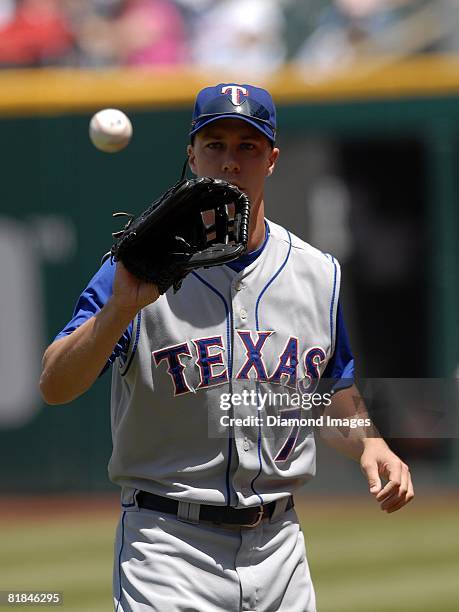 Outfielder David Murphy of the Texas Rangers warms up prior to a game with the Cleveland Indians on Sunday, May 25, 2008 at Progressive Field in...