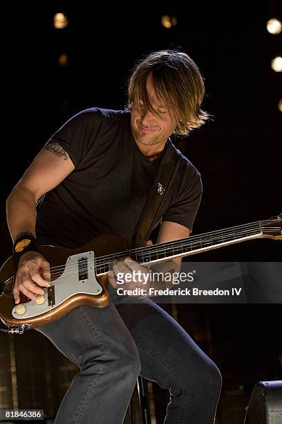Keith Urban performs at the VAULT Concert Stages during the 2008 CMA Music Festival on June 6, 2008 at LP Field in Nashville, Tennessee.