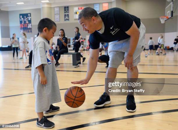 Head Coach Tyronn Lue of the Cleveland Cavaliers works with youth participants on leadership and basketball skills during the Tyronn Lue Fantasy...