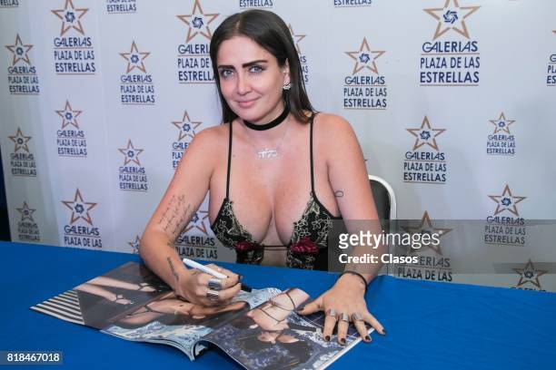 Celia Lora signs autographs during the launching of the new Playboy with her on the cover at Plaza de las Estrellas on July 13, 2017 in Mexico City,...