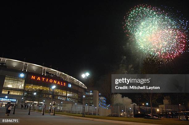 Exterior view of Nationals Park during fireworks after a baseball game between the Baltimore Orioles and the Washington Nationals on June 27, 2008 in...