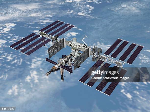 computer generated image of the international space station. - digital composite technology stock illustrations