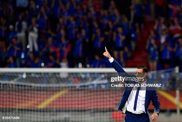 France's head coach Olivier Echouafni reacts after the UEFA Women's Euro 2017 football tournament match between France and Iceland at Stadium Koning...