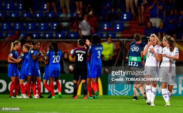 Iceland's forward Elin Metta Jensen and Iceland's forward Harpa Thorsteinsdottir react after the UEFA Women's Euro 2017 football tournament match...