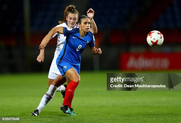Jessica Houara-DHommeaux of France and Katrin Ásbjörnsdóttir of Iceland compete for the ball during the Group C match between France and Iceland...