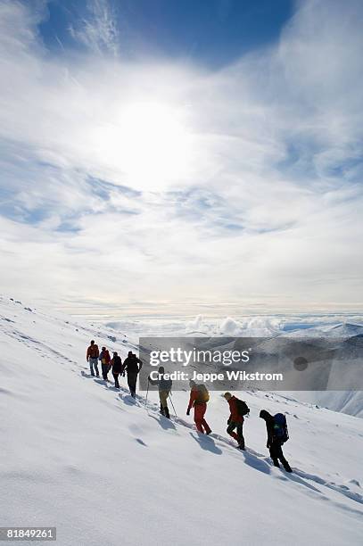 a group of people climbing kebnekaise sweden. - laponia sueca fotografías e imágenes de stock