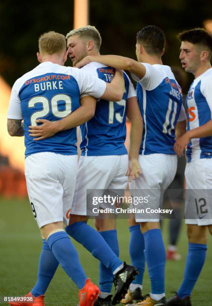 Kilmarnock goalscorer Domonic Thomas celebrates with Chris Burke and Jordan Jones during the Betfred League Cup game on July 18, 2017 in Kilmarnock,...