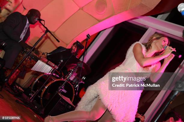 Sasha Lazard perform at The Launch of SASHA LAZARD'S "Myth of Red" Concert Series at the Top of The Standard Hotel on December 09, 2009 in New York...