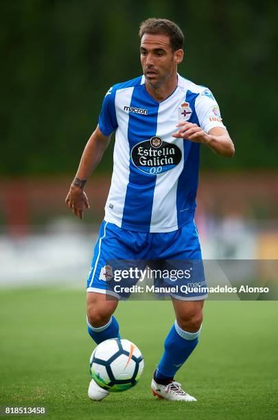 Fernando Navarro of Deportivo de La Coruna runs with the ball during the pre-season friendly match between Cerceda and Deportivo de La Coruna at O...