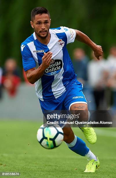 Florin Andone of Deportivo de La Coruna runs with the ball during the pre-season friendly match between Cerceda and Deportivo de La Coruna at O Roxo...