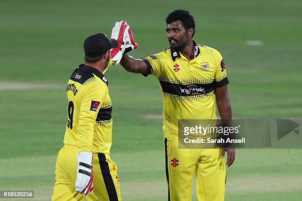 Thisara Perera of Gloucestershire celebrates with teammates after taking the wicket of Daniel Bell-Drummond of Kent Spitfires during the NatWest T20...