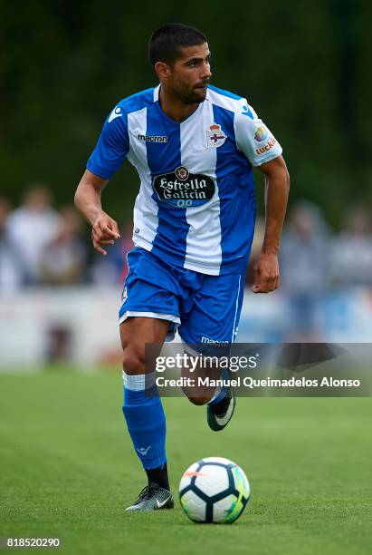 Juanfran Moreno of Deportivo de La Coruna runs with the ball during the pre-season friendly match between Cerceda and Deportivo de La Coruna at O...