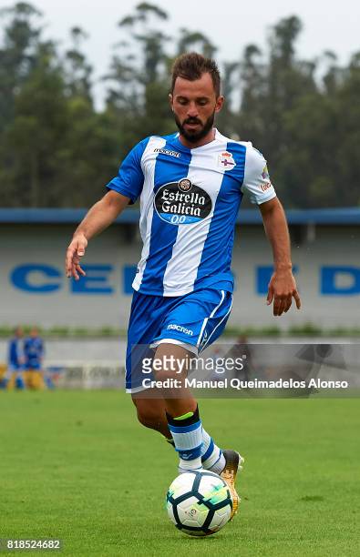 Emre Colak of Deportivo de La Coruna runs with the ball during the pre-season friendly match between Cerceda and Deportivo de La Coruna at O Roxo...
