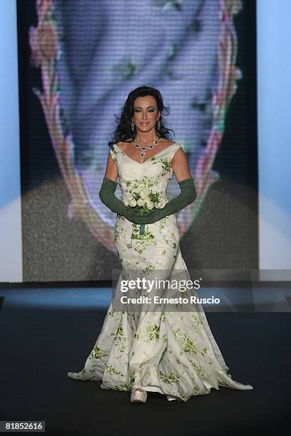 Nancy Dall'Olio walks the runway during Ettore Bilotta Haute Couture fashion show as part of Rome fashion week in Santo Spirito in Sassia on July 7,...