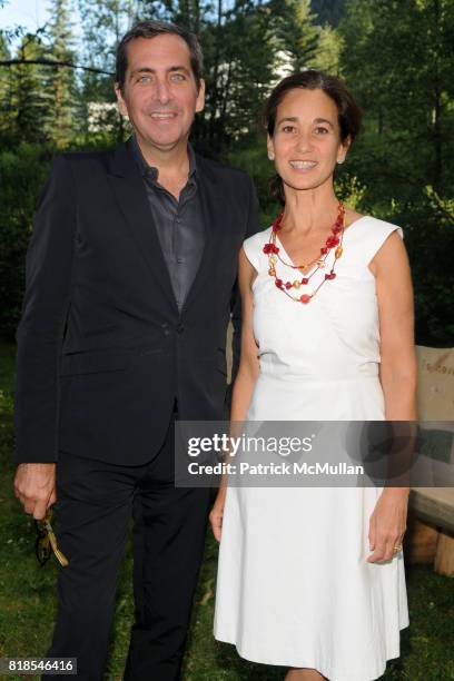 Michael Moore and Rena Neville attend ASPEN ART MUSEUM hosts artCRUSH 2010 at Aspen Art Museum on August 6, 2010 in Aspen, CO.