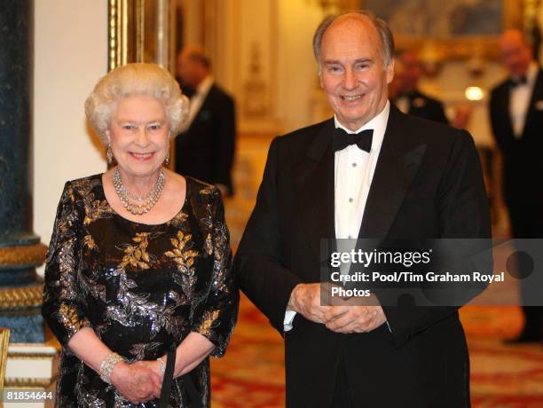 Queen Elizabeth II hosts a dinner at Buckingham Palace to mark the Golden Jubilee of SAS Prince Karim Aga Khan IV, the hereditary spiritual Imam of...