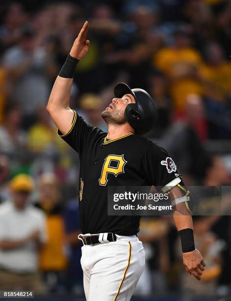 Francisco Cervelli of the Pittsburgh Pirates celebrates his solo home run during the sixth inning against the Milwaukee Brewers at PNC Park on July...