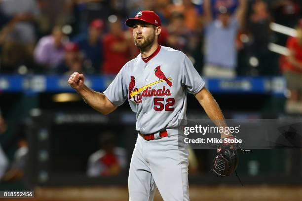 Michael Wacha of the St. Louis Cardinals pumps his fist after pitching a complete game 5-0 shutout against the New York Mets at Citi Field on July...