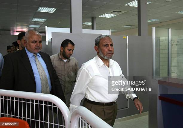 Hamas's Gaza team, including senior officials Mahmud Zahar are seen at the Rafah border crossing terminal between the southern Gaza Strip and Egypt...