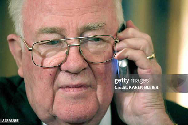 Former US Attorney General Edwin Meese III, member of the National War Powers Commission listens during a phone call prior to a press conference on...