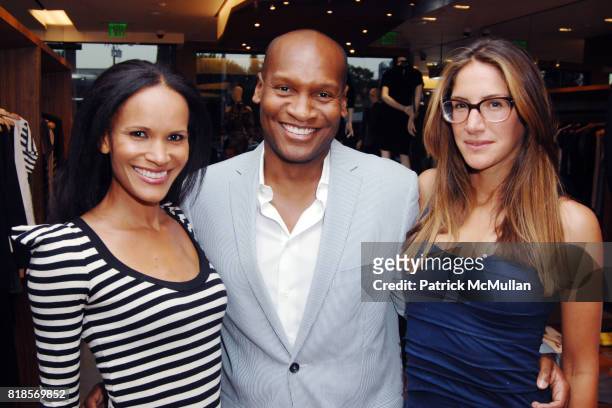 Amanda Luttrell Garrigus, Marcellas Reynolds and Minnie Mortimer attend Shopping and Champagne at ARCADE BOUTIQUE Hosted by Q MAGAZINE along with...