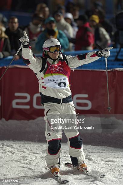 Freestyle Skiing: 2006 Winter Olympics, USA Travis Cabral victorious after Moguls Final run at Jouvenceaux, Sauze d'Oulx, Italy 2/15/2006