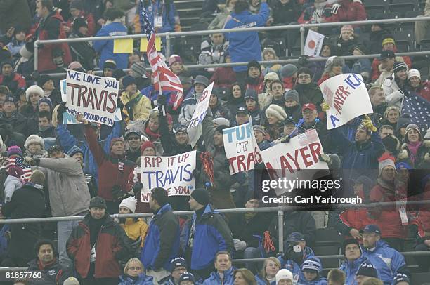 Freestyle Skiing: 2006 Winter Olympics, USA Travis Mayer fans in stands with signs during Moguls Final at Jouvenceaux, Sauze d'Oulx, Italy 2/15/2006