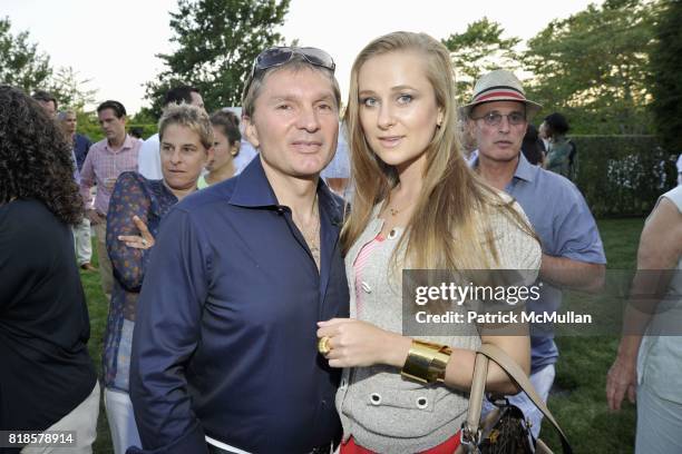 Gary Flom and Svitlana Chumakova attend GODS LOVE WE DELIVER-Mid Summer Night Drinks Benefit at Home of Chad A. Leat on June 19, 2010 in...