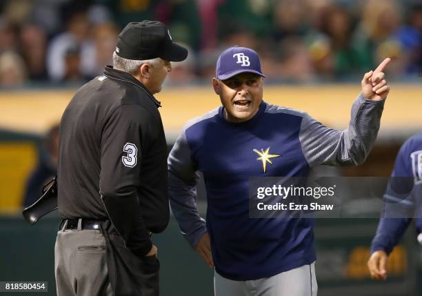 Manager Kevin Cash of the Tampa Bay Rays argues with home plate umpire Bill Welke after he was ejected in the fifth inning at Oakland Alameda...