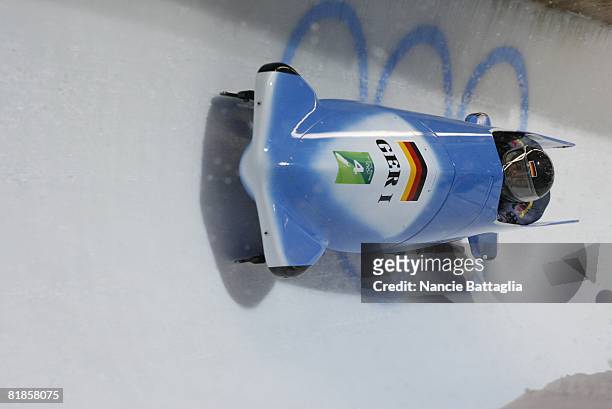 Bobsleigh: 2006 Winter Olympics, Germany Andre Lange and Kevin Kuske in action during Two Man Heat 3 at Cesana Pariol, Cesana, Italy 2/19/2006